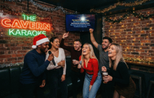 Friends singing karaoke in Liverpool at Christmas